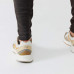 Брюки для бега зауженные мужские коричневые RUN WARM+ Kalenji